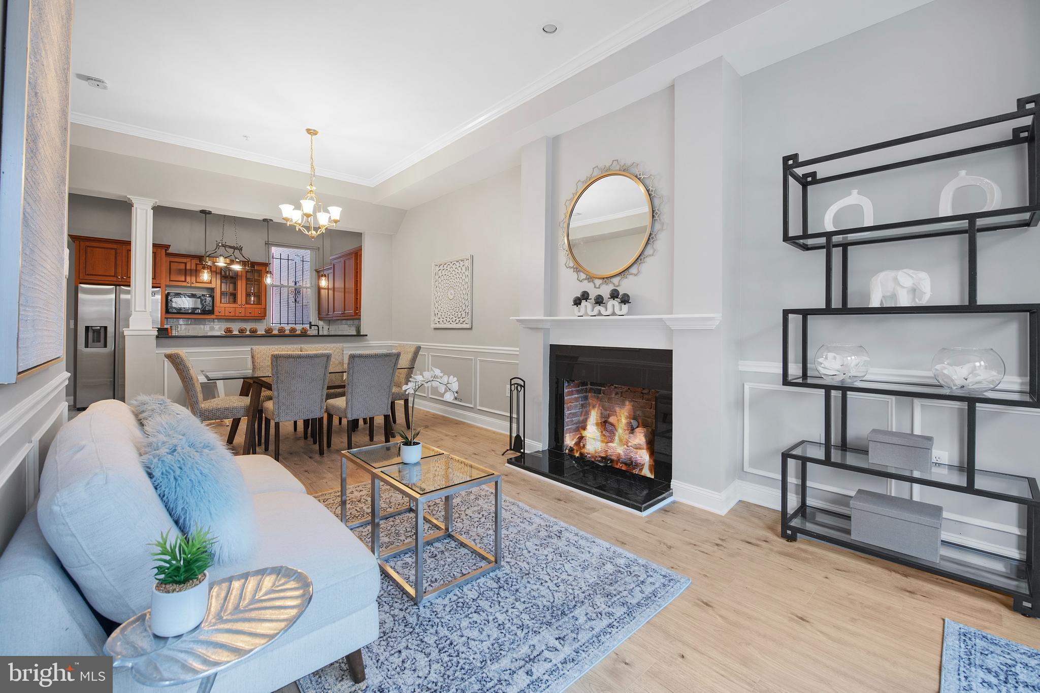 903 R Street Northwest, Unit 1 Washington, DC 20001 - Photo 5 of 32 a living room with furniture and a fireplace