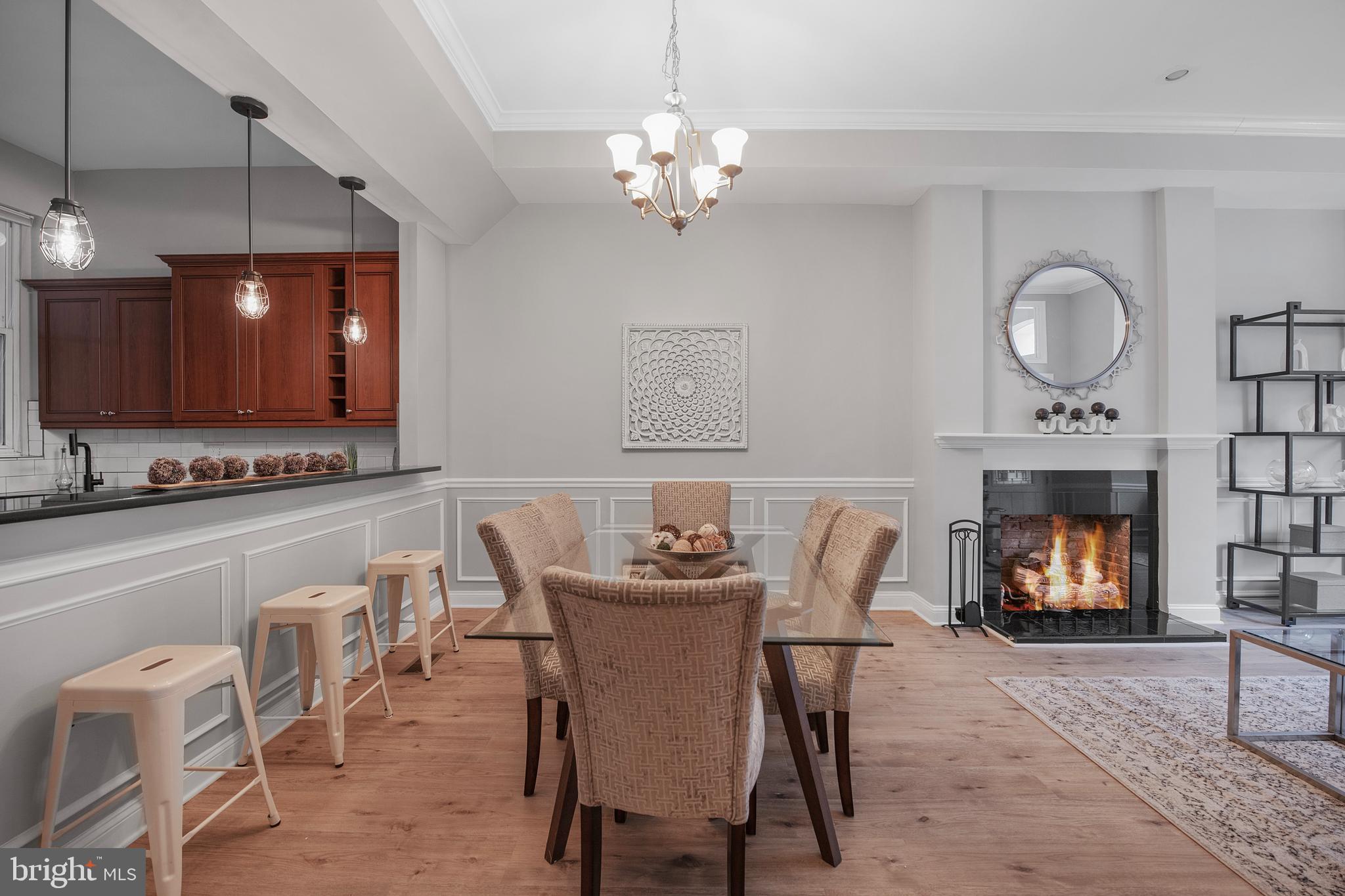 903 R Street Northwest, Unit 1 Washington, DC 20001 - Photo 10 of 32 a dining room with furniture and chandelier