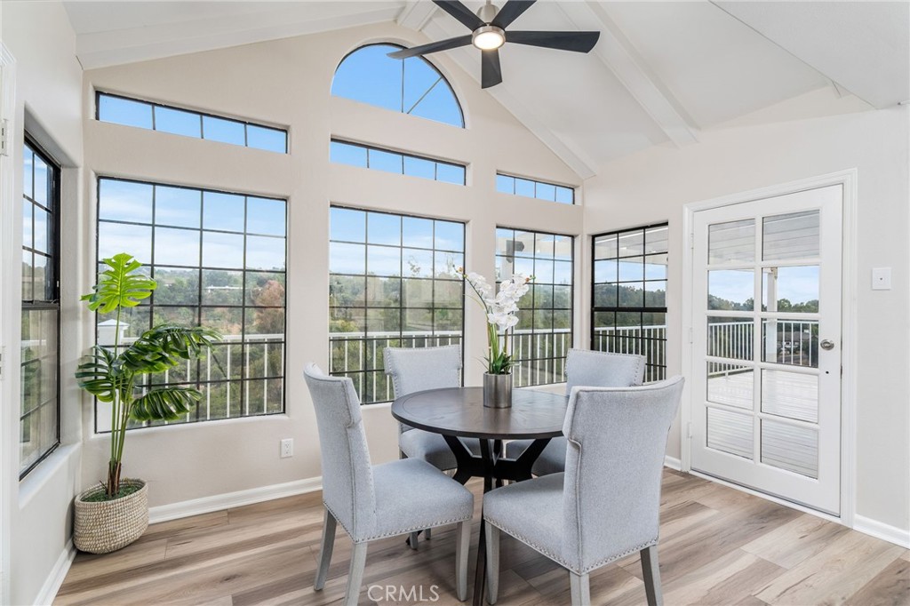 1187 Edinburgh Road San Dimas, CA 91773 - Photo 13 of 57 a view of a dining room with furniture window and wooden floor