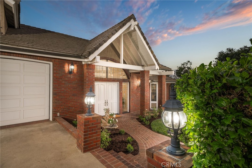1187 Edinburgh Road San Dimas, CA 91773 - Photo 2 of 57 a front view of house with yard