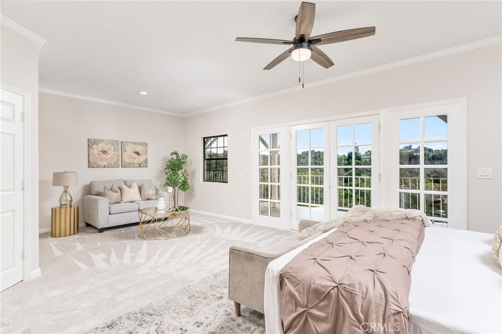 1187 Edinburgh Road San Dimas, CA 91773 - Photo 23 of 57 a spacious bedroom with a large bed and a large window