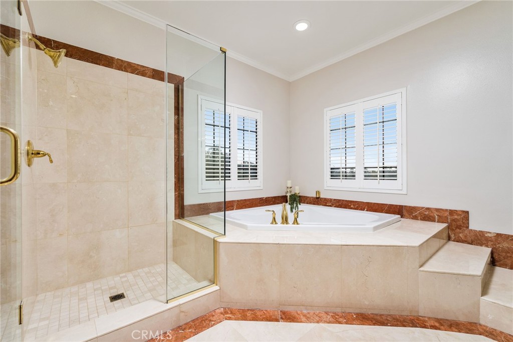 1187 Edinburgh Road San Dimas, CA 91773 - Photo 24 of 57 a bath tub sitting next to a window