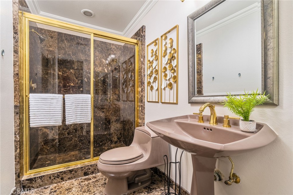 1187 Edinburgh Road San Dimas, CA 91773 - Photo 34 of 57 a bathroom with a sink toilet and shower