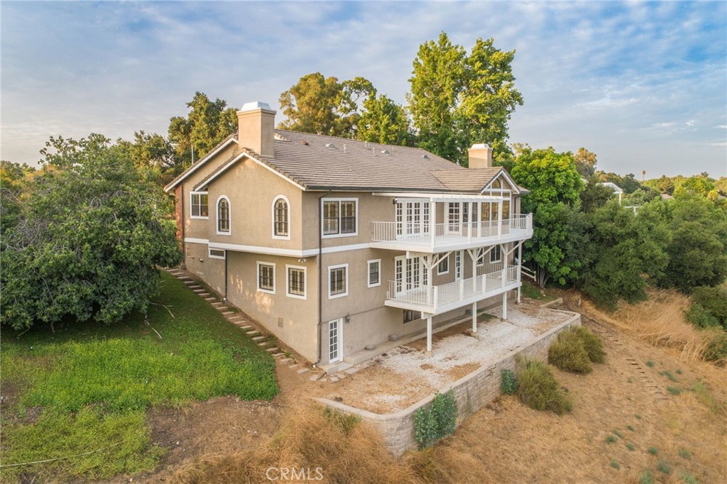 1187 Edinburgh Road San Dimas, CA 91773 - Photo 40 of 57 a balcony with a garden and deck