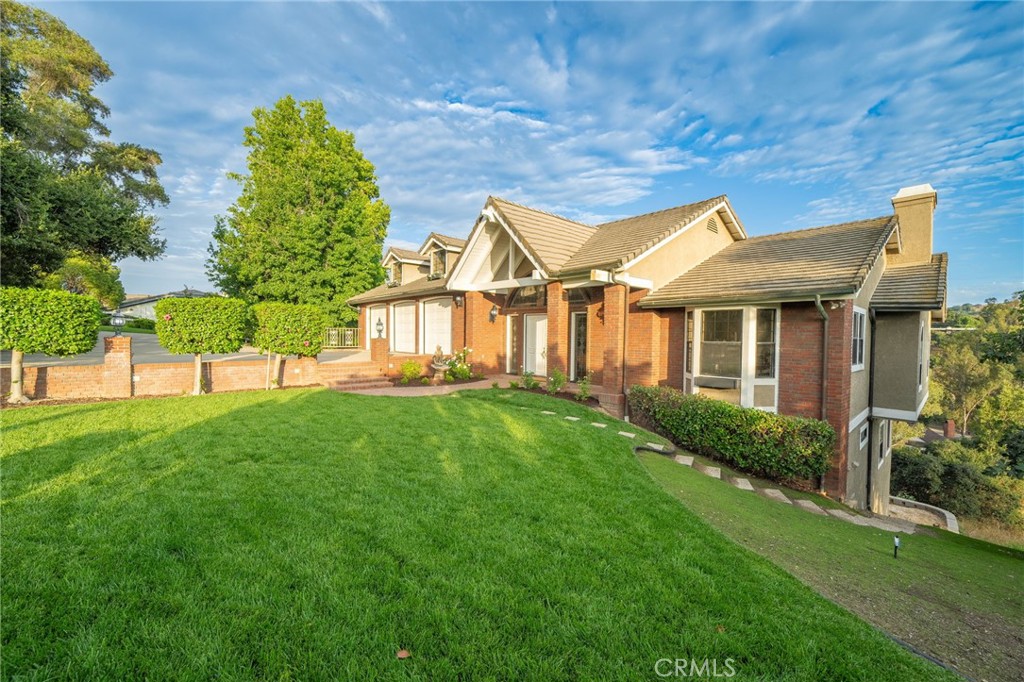 1187 Edinburgh Road San Dimas, CA 91773 - Photo 56 of 57 a view of a yard in front of a house