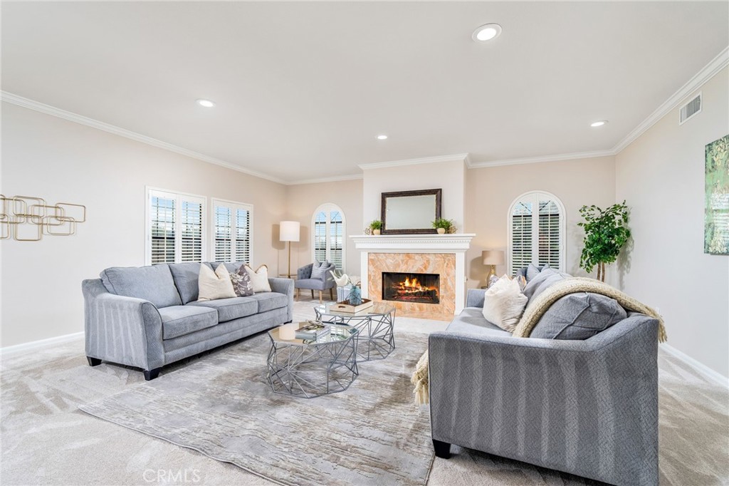 1187 Edinburgh Road San Dimas, CA 91773 - Photo 6 of 57 a living room with furniture and a fireplace