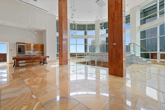 a view of a workspace with furniture