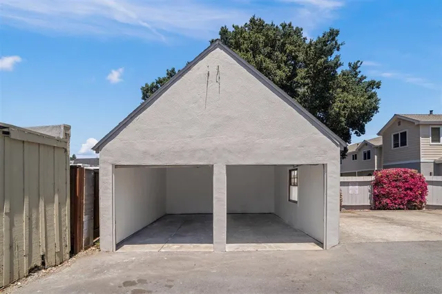 a view of house with garage