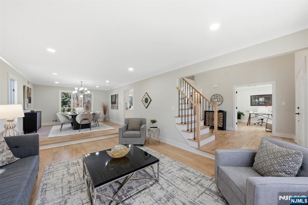 34 Knob Hill Road Morganville, NJ 07751 - Photo 12 of 50 a living room with furniture and wooden floor