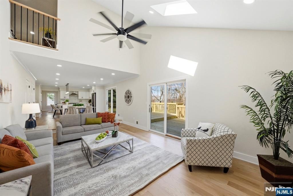 34 Knob Hill Road Morganville, NJ 07751 - Photo 24 of 50 a living room with furniture and a large window