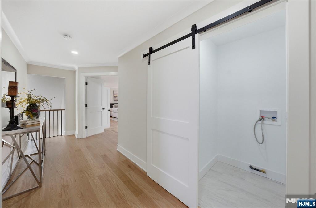 34 Knob Hill Road Morganville, NJ 07751 - Photo 32 of 50 a view of a room with wooden floor