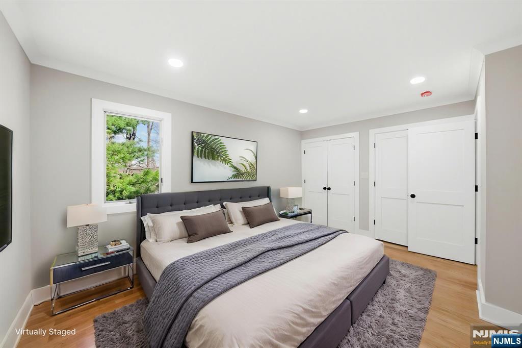 34 Knob Hill Road Morganville, NJ 07751 - Photo 42 of 50 a bedroom with a bed and a window