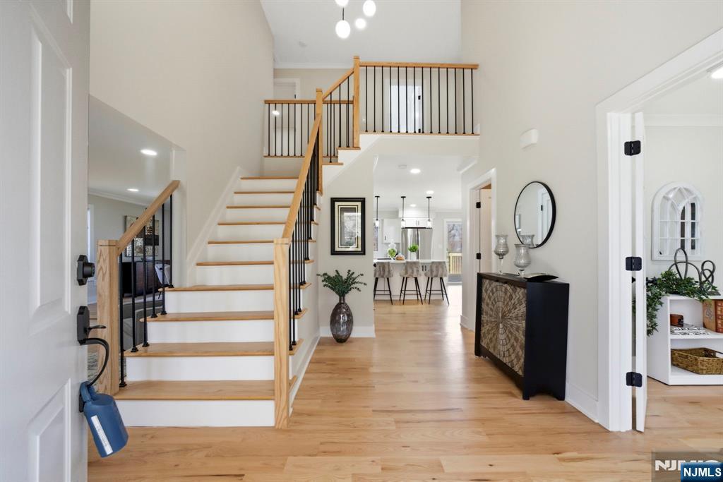 34 Knob Hill Road Morganville, NJ 07751 - Photo 6 of 50 a view of entryway and hall with wooden floor