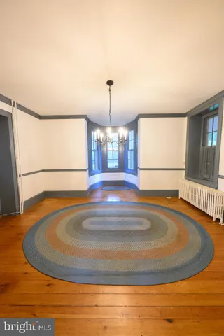 a kitchen with stainless steel appliances white cabinets and a sink