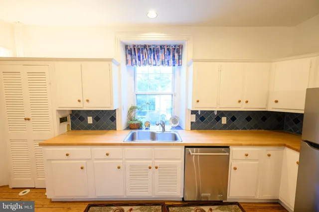 a view of a room with a furniture