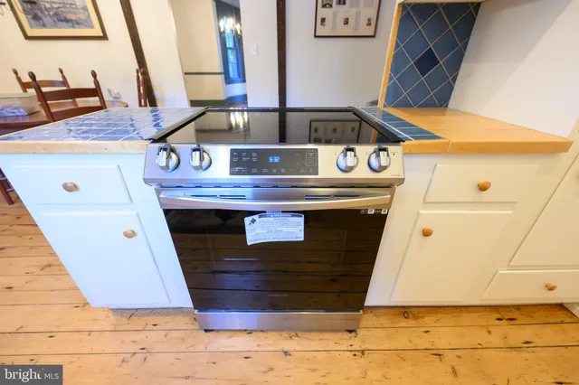 a hallway with washer and dryer
