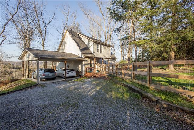 225 Wells Pointe Road Ashland City, TN 37015 - Photo 1 of 20 A true woodland retreat!