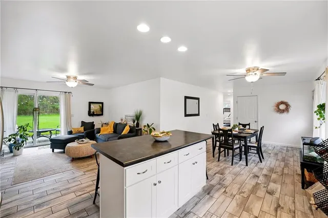 a very nice looking living room with a large window