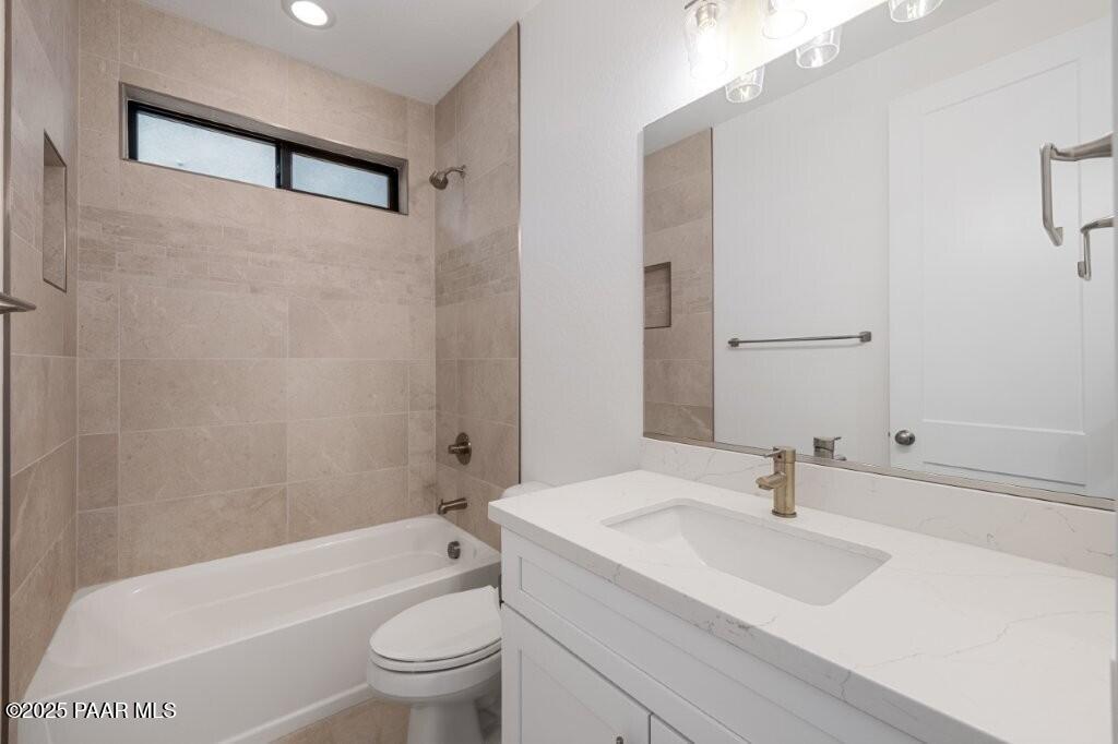 5008 Atwood Court Prescott Valley, AZ 86314 - Photo 20 of 34 a bathroom with a sink toilet and shower