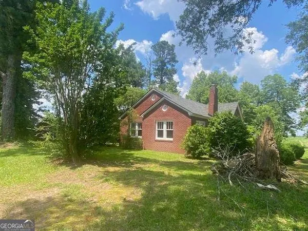 a house view with a garden space