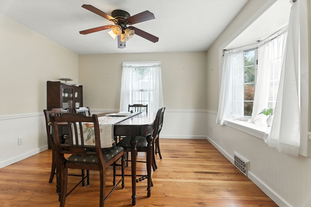 384 Abbott Street Springfield, MA 01118 - Photo 5 of 26 a view of a dining room with furniture window and wooden floor