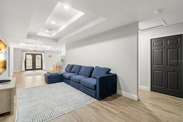 a living room with furniture and a rug