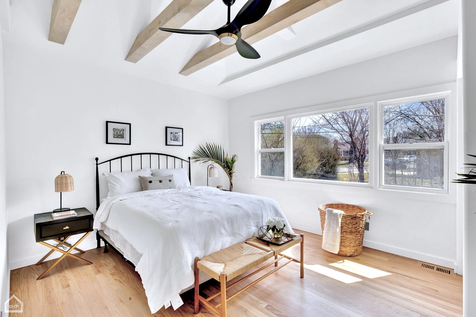 1207 Park Ridge Boulevard Park Ridge, IL 60068 - Photo 15 of 28 a bedroom with a bed wooden floor and window