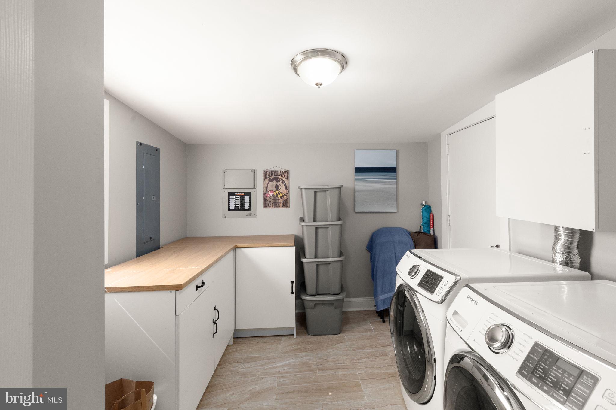 814 Foxwell Road Joppa, MD 21085 - Photo 16 of 21 a utility room with dryer and washer