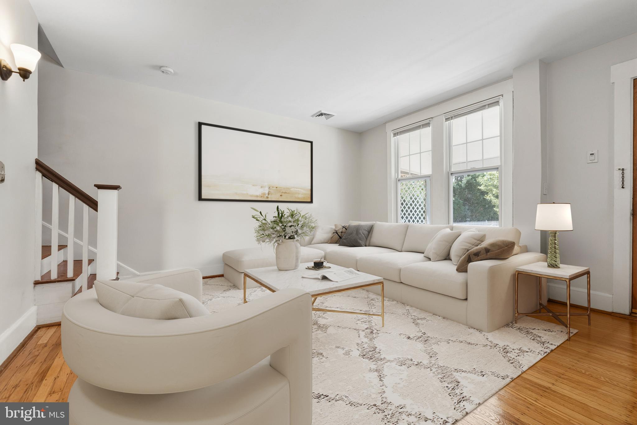 229 Wayne Avenue Narberth, PA 19072 - Photo 5 of 35 a living room with furniture and a large window