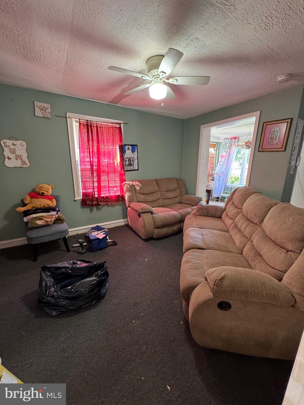 1515 Collings Road Camden, NJ 08104 - Photo 9 of 23 a living room with furniture and a window