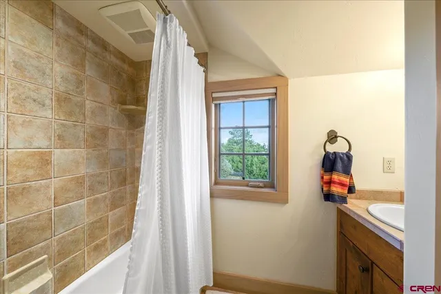 a bathroom with a window
