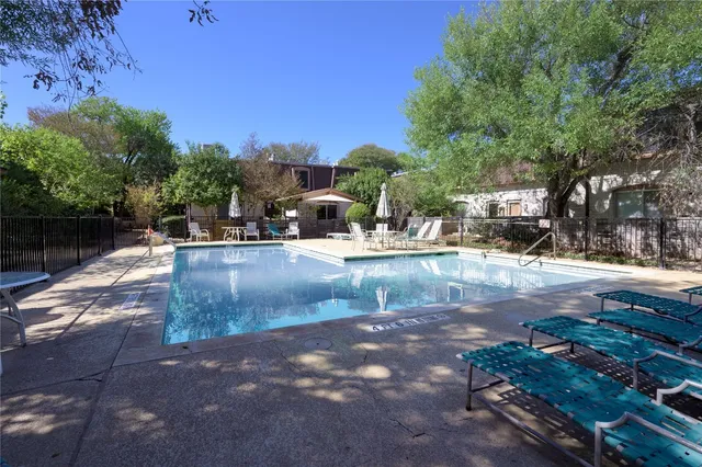 a view of a yard with an outdoor space