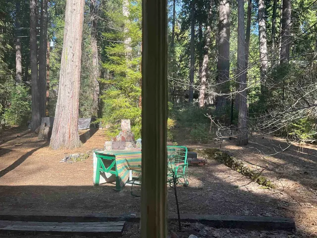 a view of a porch with a yard