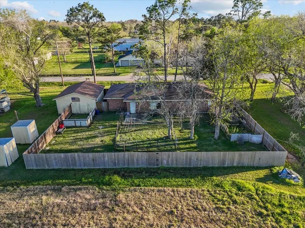 a view of empty room with wooden ceiling