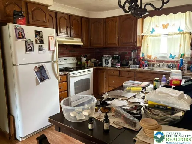 a room with lots of different colored cloths