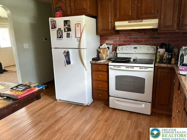 a bathroom with a sink a mirror and a vanity