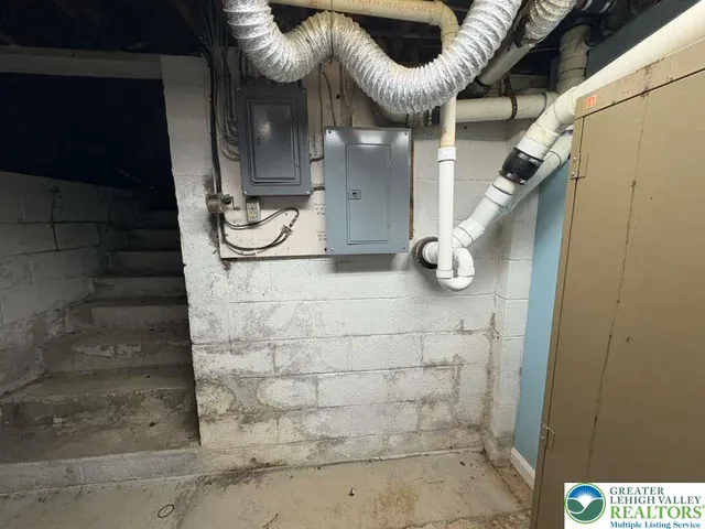 a room with furniture and a flat screen tv