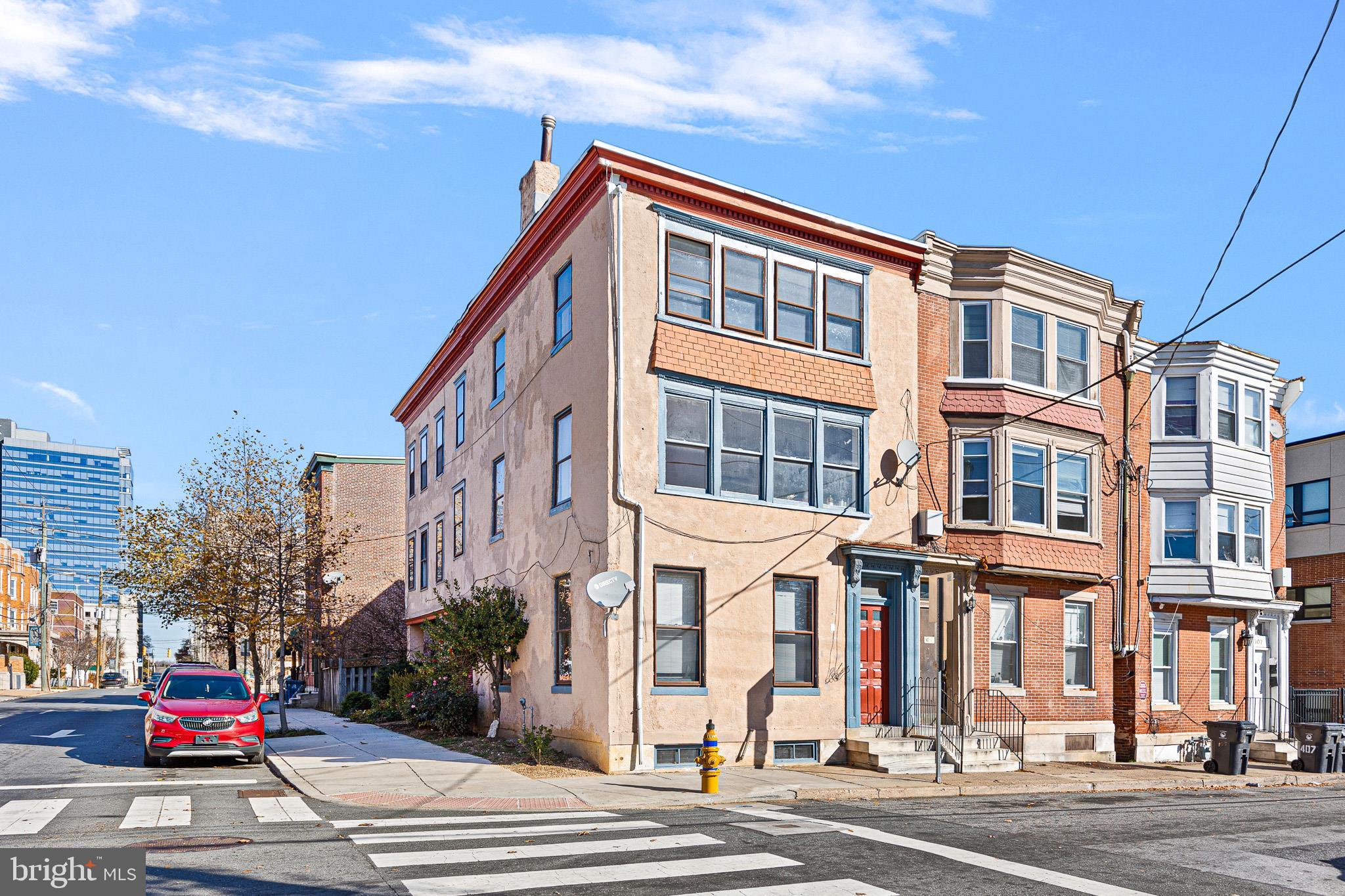 a view of a building and a street