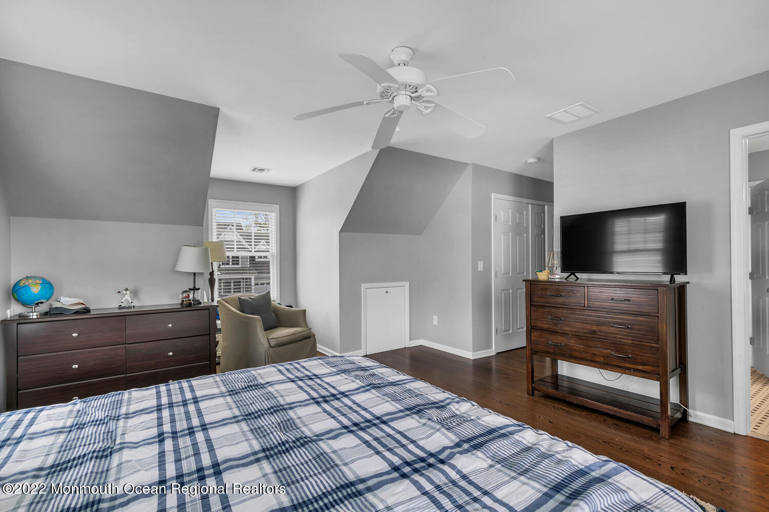 814 Pitney Drive Spring Lake Heights, NJ 07762 - Photo 15 of 22 a bedroom with a bed and a flat screen tv