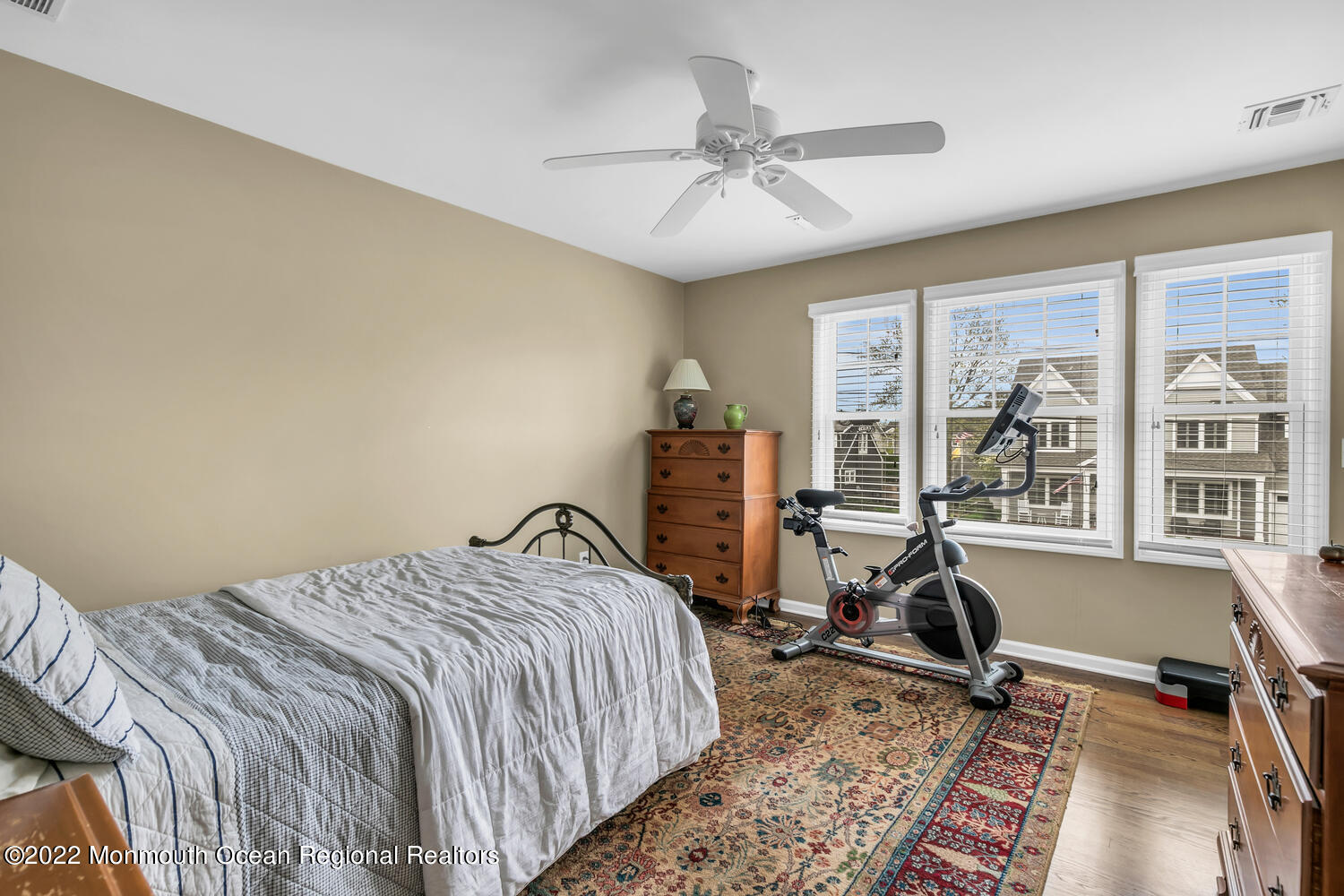 814 Pitney Drive Spring Lake Heights, NJ 07762 - Photo 17 of 22 a bedroom with a bed and glass door