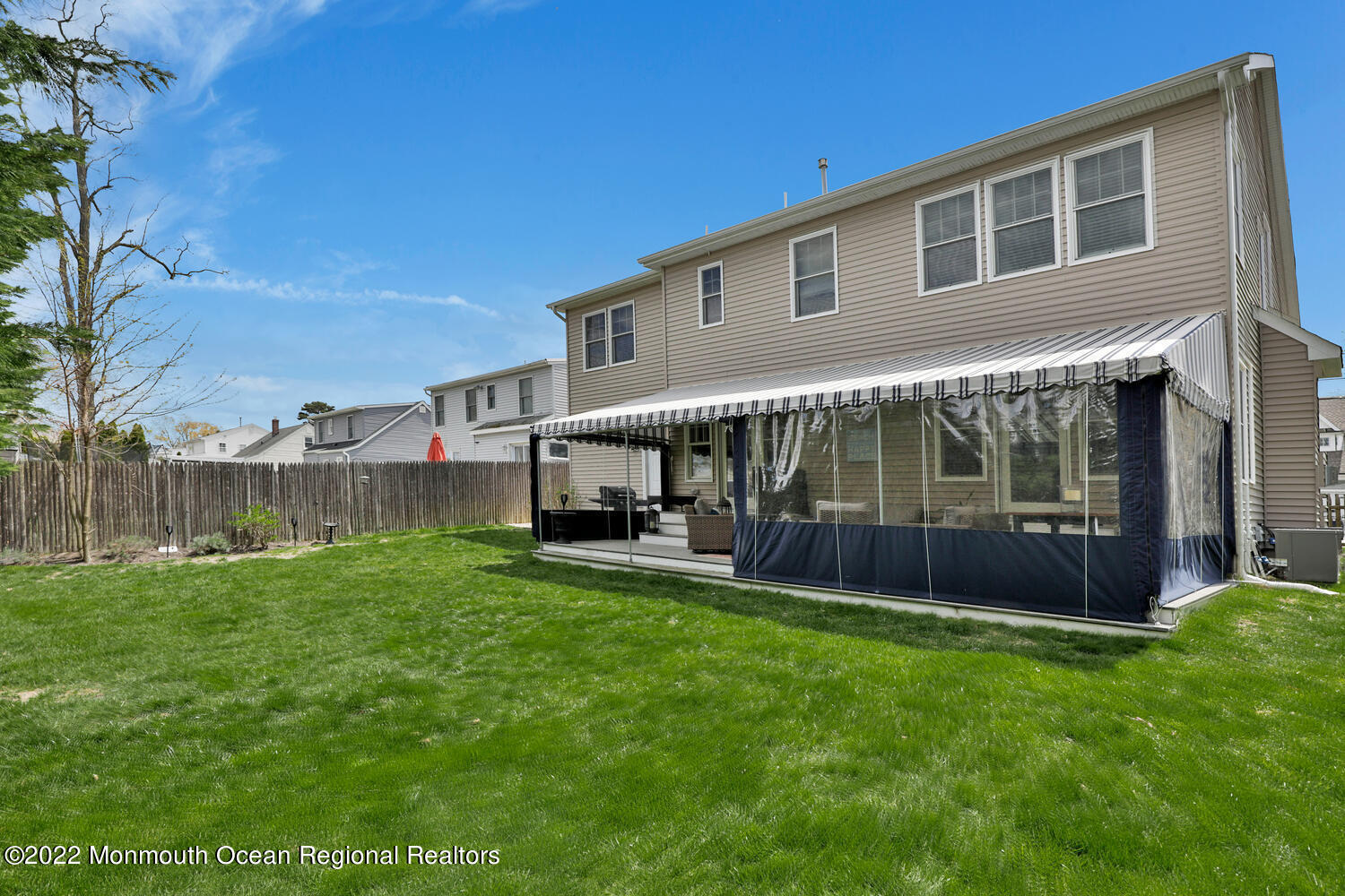 814 Pitney Drive Spring Lake Heights, NJ 07762 - Photo 21 of 22 a view of a house with a yard and sitting area