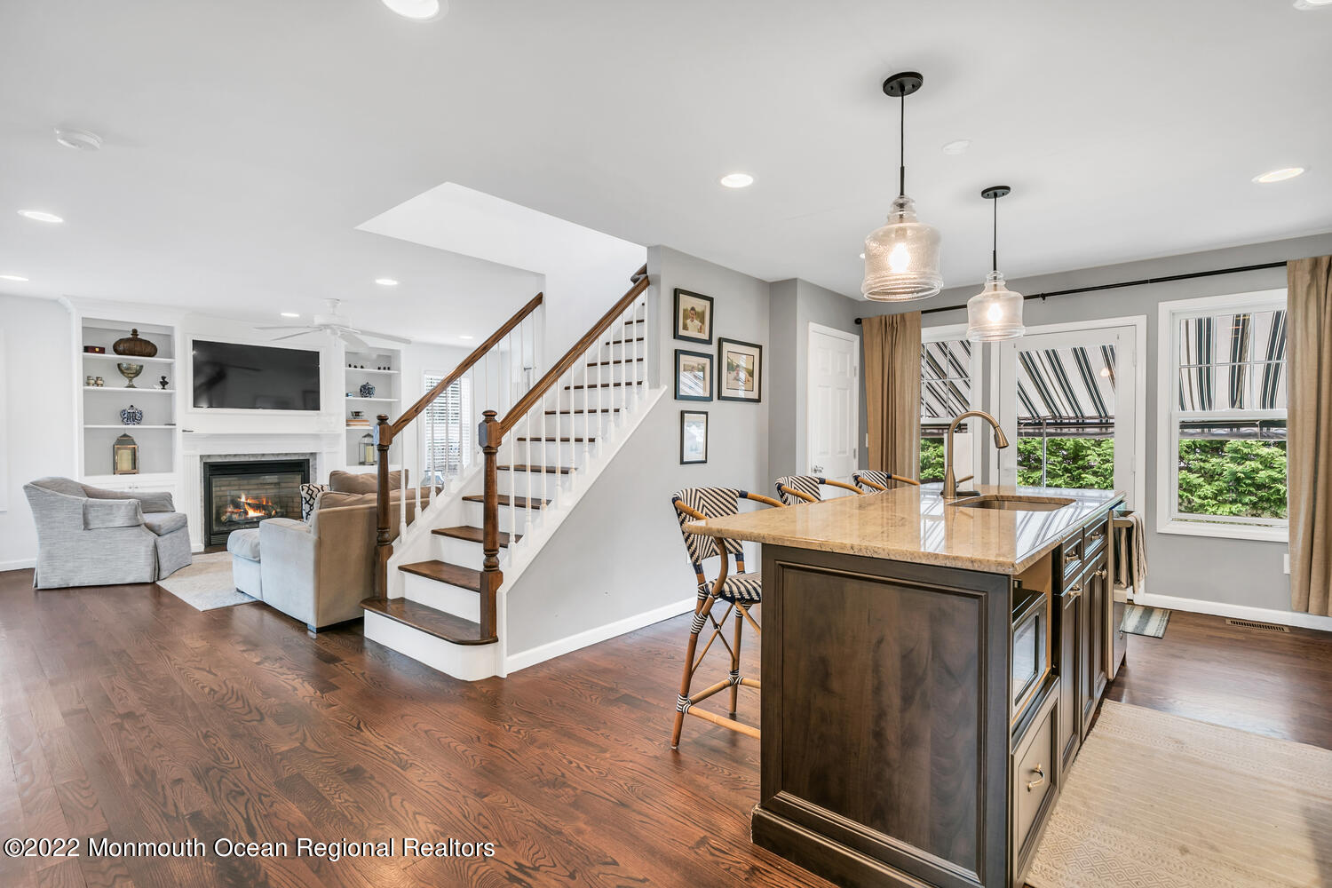 814 Pitney Drive Spring Lake Heights, NJ 07762 - Photo 7 of 22 a view of a livingroom with furniture stairs and a floor to ceiling window