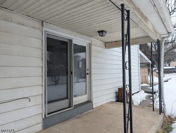 a backyard of a house with seating space