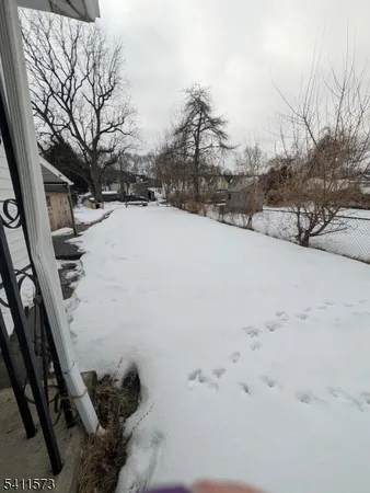 a view of snow on the road