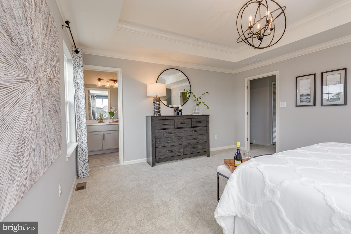 70 Aviary Road West Deptford, NJ 08086 - Photo 12 of 16 a bedroom with a bed and a chandelier