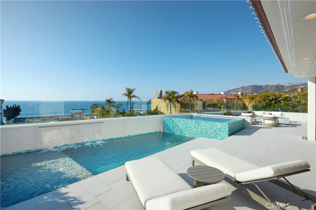 44 Ritz Cove Drive Dana Point, CA 92629 - Photo 12 of 34 a view of a terrace with couches and city view