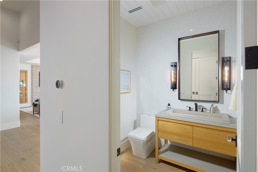 44 Ritz Cove Drive Dana Point, CA 92629 - Photo 18 of 34 a bathroom with a sink and a mirror