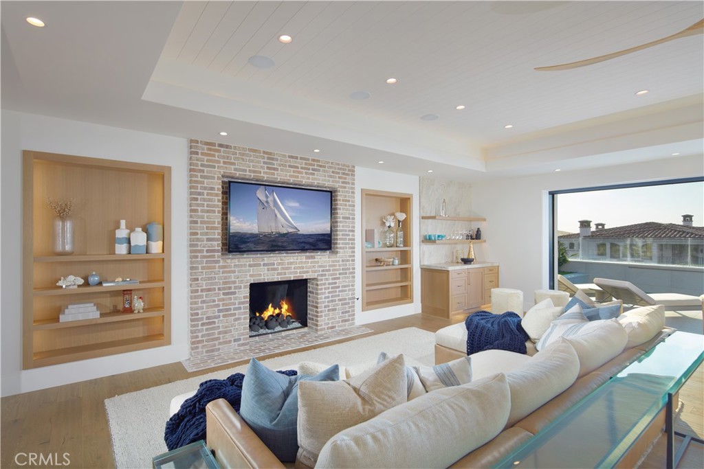 44 Ritz Cove Drive Dana Point, CA 92629 - Photo 20 of 34 a living room with furniture and a fireplace