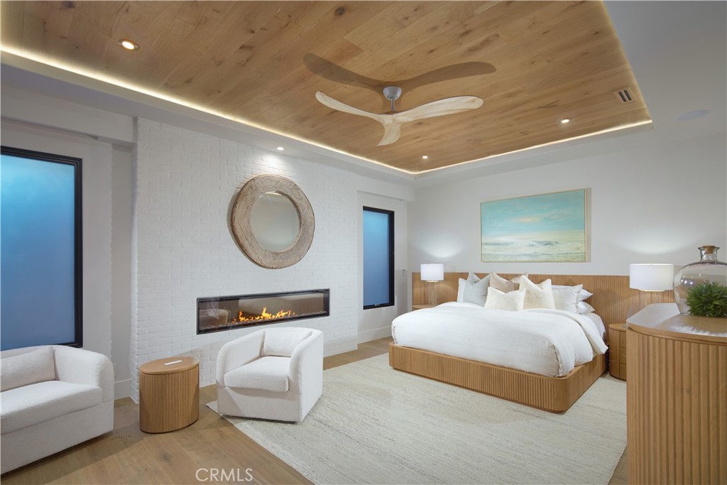 44 Ritz Cove Drive Dana Point, CA 92629 - Photo 21 of 34 a bedroom with a bed and a couch