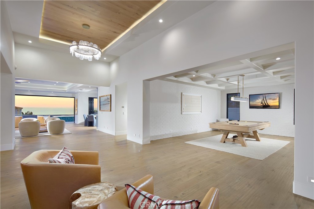 44 Ritz Cove Drive Dana Point, CA 92629 - Photo 32 of 34 a living room with furniture and a table